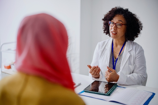 A Woman Consults With a Doctor About Cervical Cancer and HPV in Fort Collins & Loveland, CO